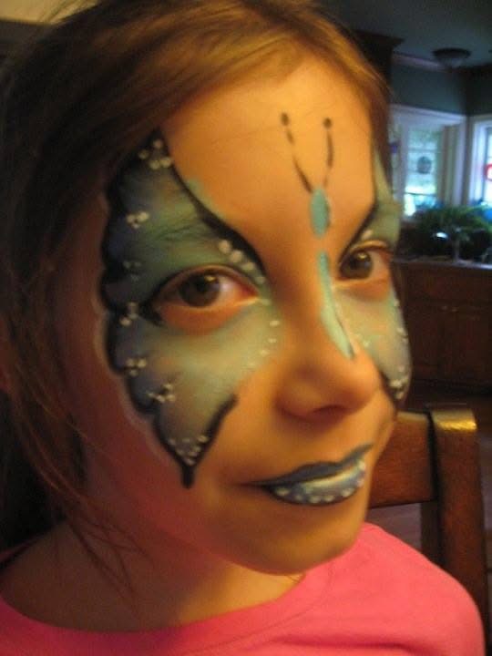 Butterfly face paint design by Brigid's Fantasy Faces